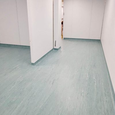 Hospital corridor image light green flooring